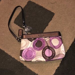 Purple brown and beige Coach wristlet